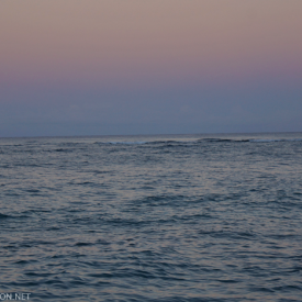 Moon setting into the sea